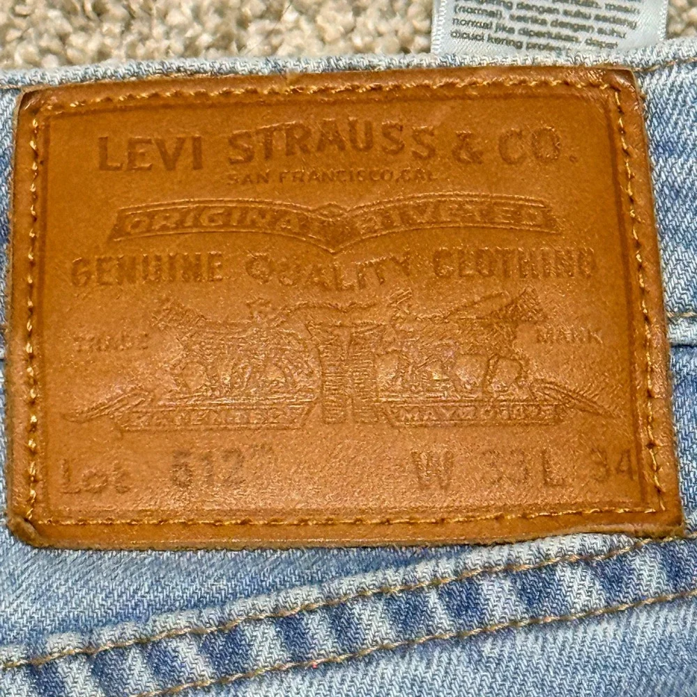 Levi's Womens 512 Slim Taper Jeans Light Wash Denim WaterLess W33 L34 Blue Denim